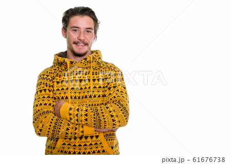 Studio shot of young happy man smiling with arms crossed isolate Studio shot of young happy man smiling with arms crossed isolate 61676738