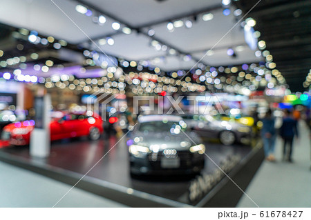 Blurred background of new cars displayed in luxury Blurred background of new cars displayed in luxury 61678427