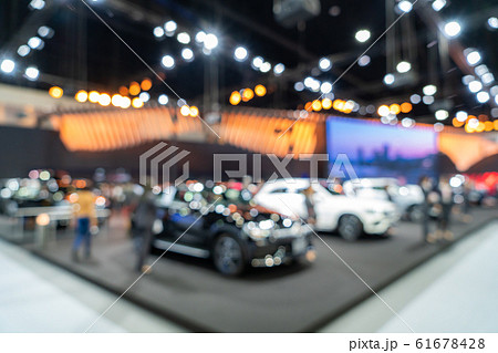 Blurred background of new cars displayed in luxury 61678428