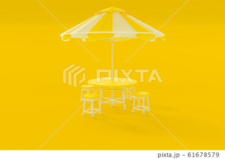 Yellow table and chairs and umbrella 61678579