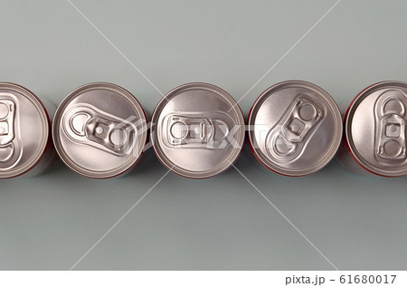 Many new aluminium cans of soda soft drink or Many new aluminium cans of soda soft drink or 61680017