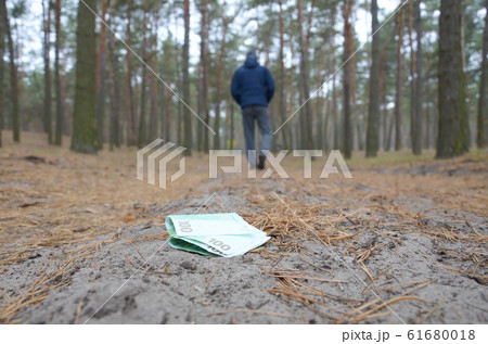 Young man loses his euro money bills on Russian Young man loses his euro money bills on Russian 61680018