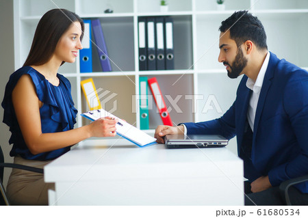 Business. Office Business Woman and Business Man Leading Talks a 61680534