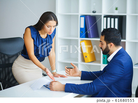 Business. Office Business Woman and Business Man Leading Talks a 61680555