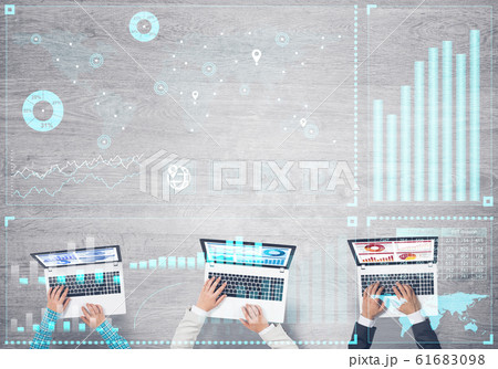 Top view of businesspeople sitting at table and using gadgets Top view of businesspeople sitting at table and using gadgets 61683098