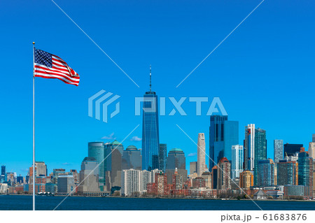 Scene of Flag of America over New york cityscape river side which location is lower manhattan,Architecture and building with tourist and Independence day concept Scene of Flag of America over New york cityscape river side which location is lower manhattan,Architecture and building with tourist and Independence day concept 61683876