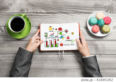 Businesswoman and her business notes Businesswoman and her business notes 61685262