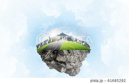 Modern cityscape with towers and skyscrapers on green part of land Modern cityscape with towers and skyscrapers on green part of land 61685292