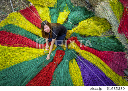 Top view of Asian traveler female making the traditional vietnam mats in the old traditional village at dinh yen, dong thap, vietnam, tradition artist concept 61685880