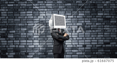 Businessman with monitor instead of head. 61687075