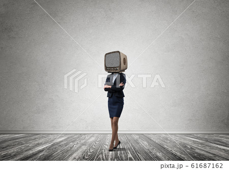 Business woman with an old TV instead of head. 61687162