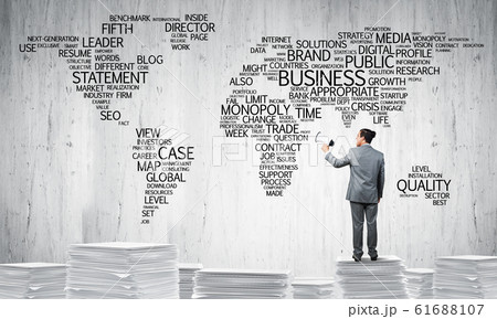 Businessman standing with megaphone. 61688107