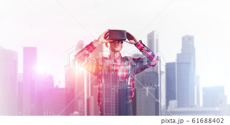 Guy wearing checked shirt and virtual mask demonstrating some emotions Guy wearing checked shirt and virtual mask demonstrating some emotions 61688402