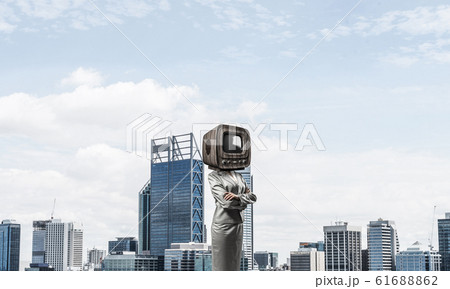 Business woman with old TV instead of head. 61688862