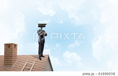 Concept of security and privacy protection with camera headed man Concept of security and privacy protection with camera headed man 61690038