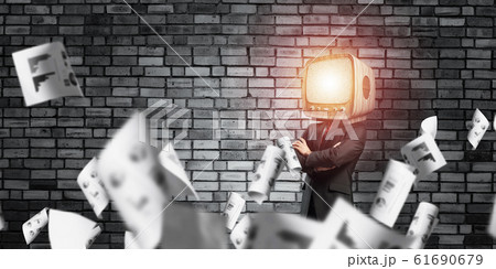 Businessman with old TV instead of head. Businessman with old TV instead of head. 61690679