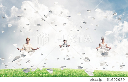 Young family keeping mind conscious. Young family keeping mind conscious. 61692029