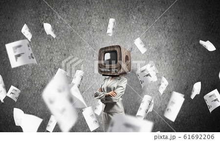 Business woman with old TV instead of head. 61692206