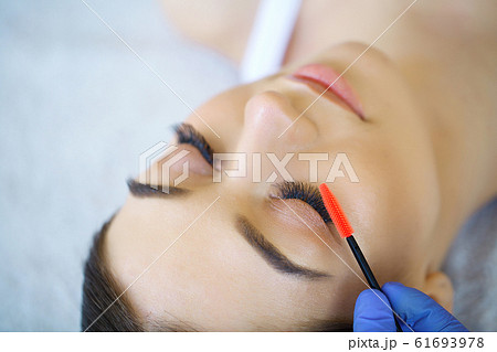 Woman eye with long eyelashes. Mascara Brush. High quality image 61693978