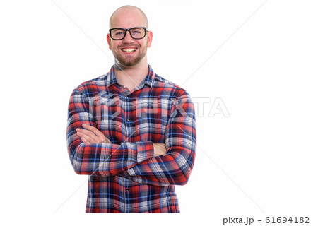 Studio shot of young bald muscular man Studio shot of young bald muscular man 61694182