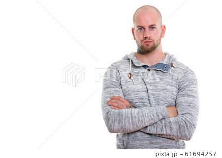 Studio shot of young bald muscular man 61694257