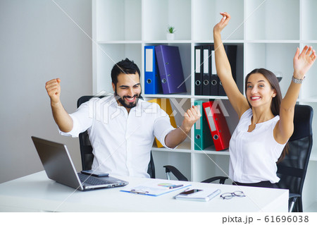 Group of young executives having a work meeting 61696038