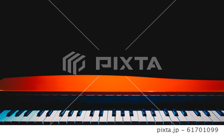 red grand piano, isolated on black. music background 61701099