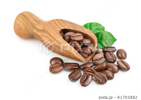 Heap of roasted coffee beans in wooden scoop with leaves isolated on white background with clipping path and full depth of field 61703882