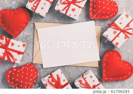 Envelope Mail with Red Heart and gift box over 61706285