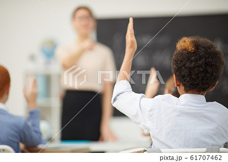 Children working in the classroom Children working in the classroom 61707462