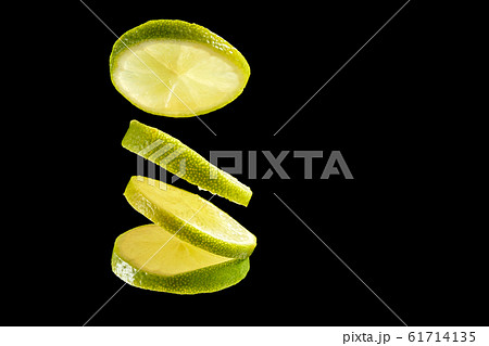 Green fresh organic kiwi slices on black background 61714135