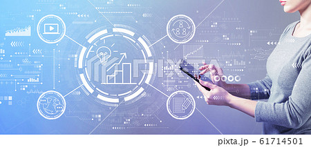 Content marketing concept with woman using a tablet 61714501