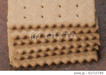 Rye cracker om a woodem board Rye cracker om a woodem board 61715789