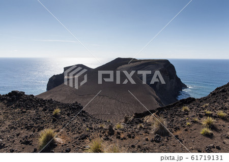 Volcanic rock and ocean Volcanic rock and ocean 61719131