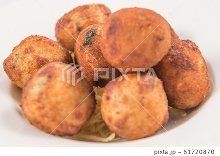 Salt Cod Croquettes balls with straw potatoes 61720870