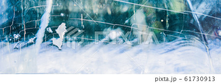 Blue ice surface with scratches. Abstract background of ice structure BANNER, LONG FORMAT 61730913