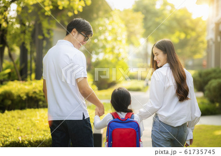 Asian family go to school together 61735745