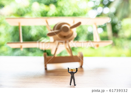 Retro wooden airplane toy with miniature 61739332