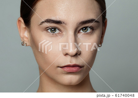 Young beautiful woman without makeup cosmetics Young beautiful woman without makeup cosmetics 61740048