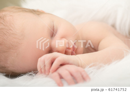 cute sleeping newborn cute sleeping newborn 61741752