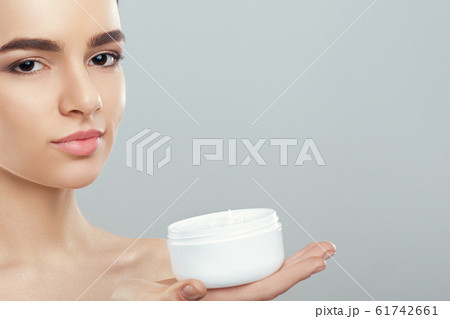 Beautiful Young Woman with Clean Fresh Skin look 61742661