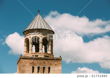 Mtskheta Georgia. Close Bell Tower Of Svetitskhoveli Cathedral Of Living Pillar, Blue Sky Background 61742880