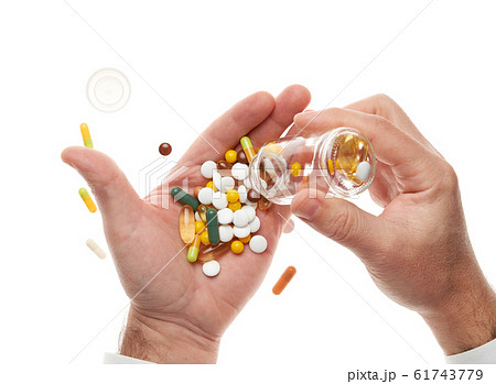 Man hand opening glass bottle full of pills, Man hand opening glass bottle full of pills, 61743779