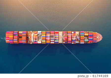 Aerial view of container cargo ship in sea. Aerial view of container cargo ship in sea. 61744169