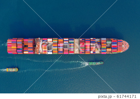 Aerial view of container cargo ship in sea. Aerial view of container cargo ship in sea. 61744171