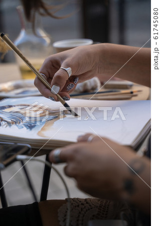 Street portrait artist sketch a picture on the street Street portrait artist sketch a picture on the street 61745080