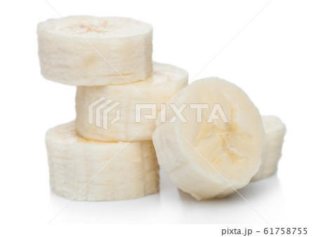 Fresh ripe organic banana sliced pieces on white Fresh ripe organic banana sliced pieces on white 61758755