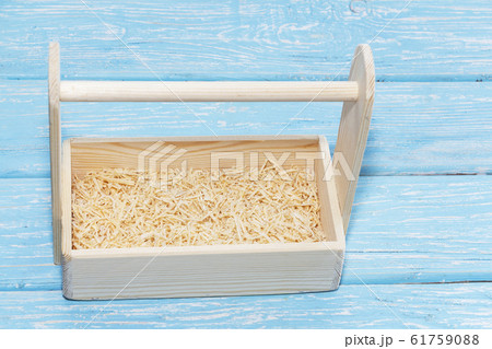 Empty wooden box. Made of pine, on a light white Empty wooden box. Made of pine, on a light white 61759088