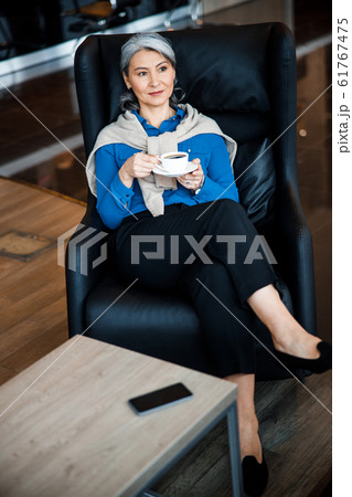 Beautiful confident lady with coffee stock photo 61767475