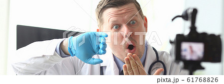 Concerned doctor practitioner Concerned doctor practitioner 61768826